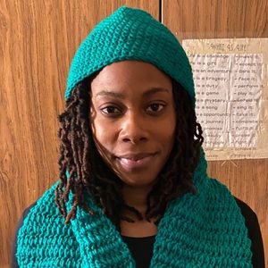 Handmade-knitted scarf and hat by Lydia Fludd